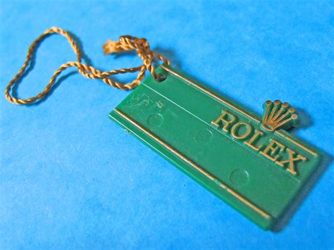 rolex green hang tags.